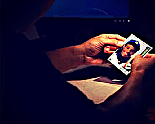 Image of a person examining a card
